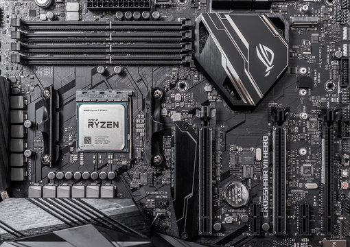 UZHGOROD, UKRAINE - October 25, 2018: Processor Ryzen 7 2700X against the background of a computer motherboard Asus rog crosshair vii hero.