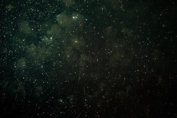 Obraz premium the sky after fireworks with sparks of light and smoke from the charges