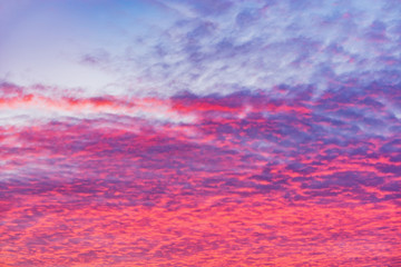 Colorful clouds after rain at sunset time.