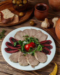 Meat assortment with cow tongue, red pate