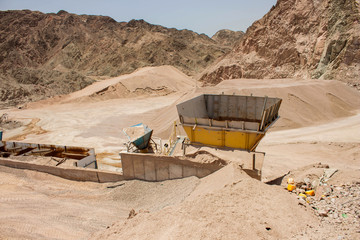 abandoned machinery equipment steel factory container in human hand made desert quarry  © Artem Kniaz