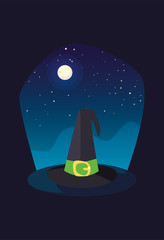 witch hat with moon in scene of halloween