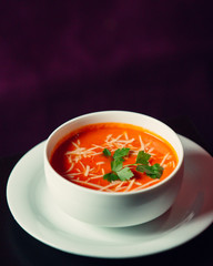 Close up of tomato sauce with grated cheese on top