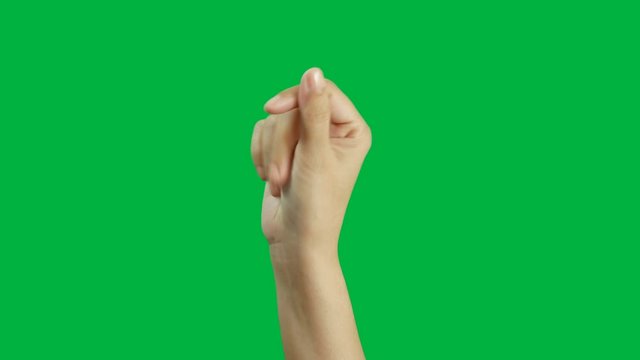 4K. close-up woman hand snap finger or clicks hand isolated on chroma key green screen