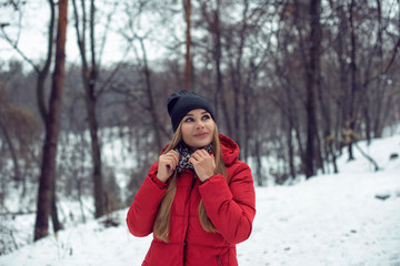 December walk with a young pretty blonde