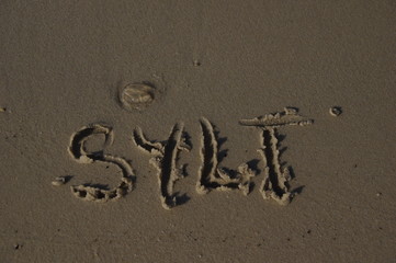 Schrift Sylt im Strandsand