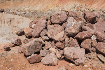 Close-up of red stone square pile for road construction