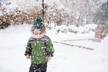 Kids walk in the park with first snow