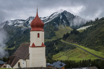 view of church and mountains in the background