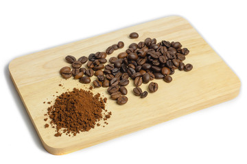 black pepper in wooden spoon isolated on white