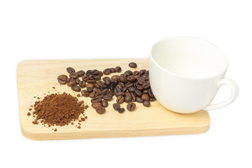 cup of coffee with beans on white background