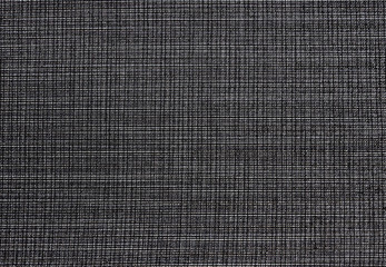 Textured background of black natural textile