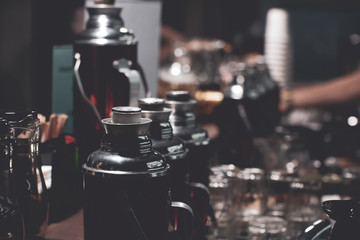 Fototapeta na wymiar set of tea thermoses in a tea cafe