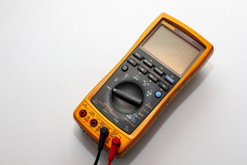 Yellow Multimeter, A multimeter or a multitester is an electronic measuring instrument. A typical...