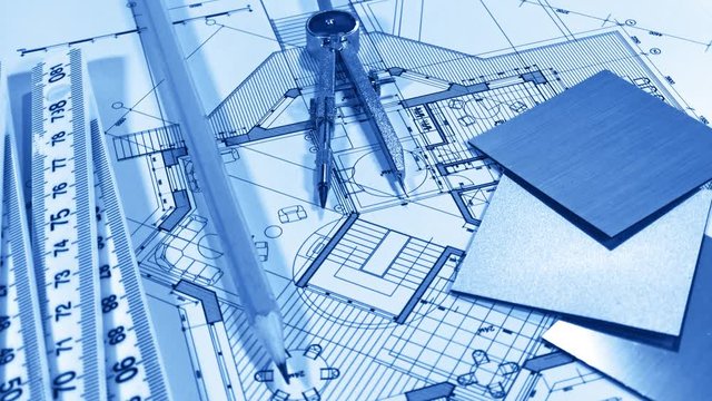 Blueprints: architectural drawings, yardstick - folding ruler & samples of modern interior decoration materials - decorative plastics smoothly rotate on the surface of the architectural plan