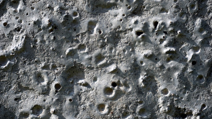 Concrete wall texture like moon surface