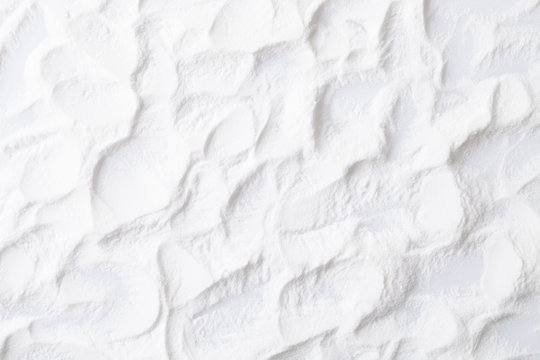 Background Baking Soda Powder Scattered On White Background.