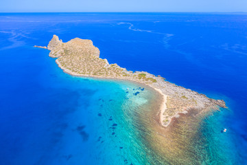 Glaronisi island near the amazing beach of Kolokitha, Elounda, Crete, Greece.