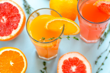 Orange and grapefruit juices. Juicy and vibrant citrus fruits.