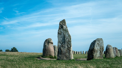 Landmark - Ale Stones (Ales stenar) old monument of stones. A sunny summer day in Kåseberga,...
