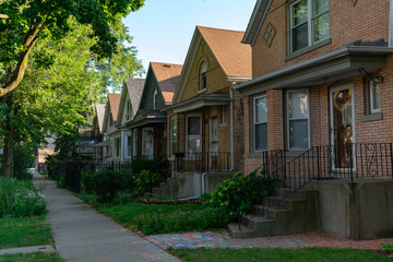 Fototapeta na wymiar Row of Similar Old Brick Homes in Logan Square Chicago