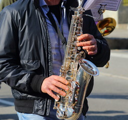 Playing wind instruments during cultural events