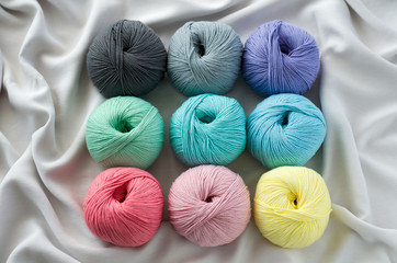 Multi-colored skeins of thread