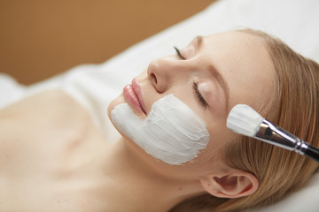 people, beauty, cosmetology and treatment concept - close up of