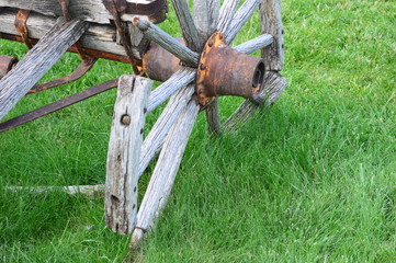 broken wooden wagon wheel