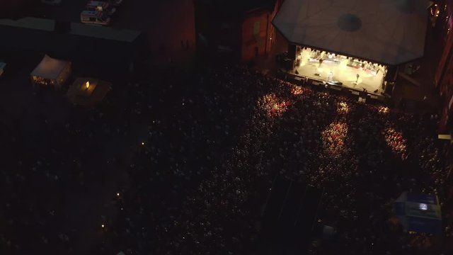 aerial flight over a konzert at night with 5000 people in Germany