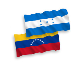 Naklejka premium Flags of Venezuela and Honduras on a white background