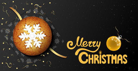 Horizontal postcard with round christmas cookie and text merry christmas
