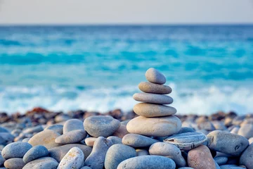 Fotobehang Rustgevend Zen balanced stones stack on beach  © Dmitry Rukhlenko