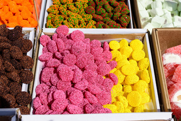 Mixed types of traditional Turkish jelly candies displayed for sale at an weekend street food market