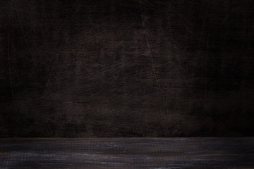 Dark wooden table and wall perspective, empty, background or texture
