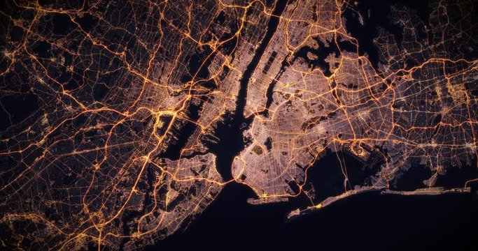 Aerial night view of city of New York, USA. Traffic and street light glowing. Camera flying high above, moving closer and rotating from space filming cinematic straight down. 3d animation rendering.