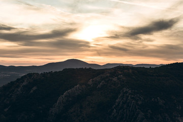 Beautiful view of the natural mountain landscape and sunset sky in Montenegro in the evening.