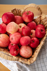 Ripe red apples in a wicker box. Top view with space for your text.