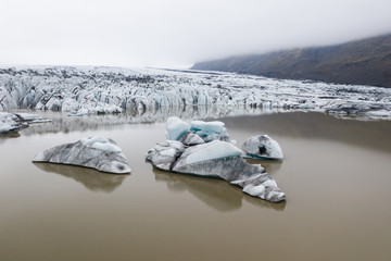 Skaftafellsjokull glacier with big pieces of ice in water