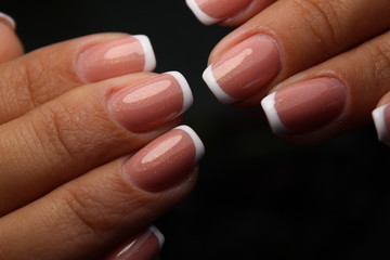 Closeup photo of a beautiful female hands with elegant manicure