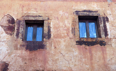Fototapeta na wymiar windows on a medieval house