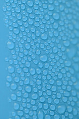 water drops closeup on blue background