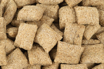 Dry breakfast cereal with chocolate filling. Chocolate pads. Closeup view