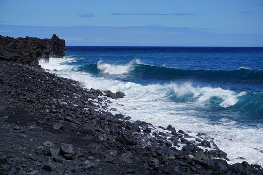 One of the newest beaches in the world - new black sand at Pohoiki Beach in Isaac Hale Park in Hawaii was created after the 2018 eruptions of Kilauea Volcano.