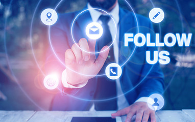 Text sign showing Follow Us. Business photo showcasing Act of demonstrating to invite an individual or group to join his company