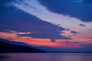 Fototapeta na wymiar Sunrise about lake Baikal in the summer