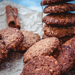 Homemade healthy oat cookies with cinnamon on brown parchment. Healthy food concept. Healthy snack