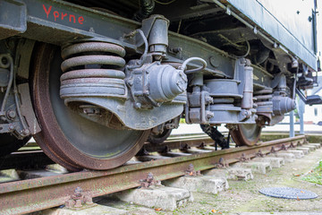 an old historical train of the Deutsche Reichsbahn from the times of the GDR stands on a siding