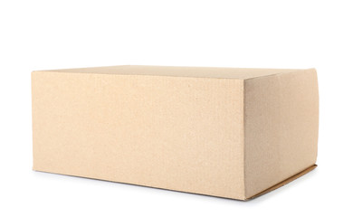 Closed cardboard box on white background. Mockup for design