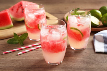 Delicious refreshing watermelon drink on wooden table